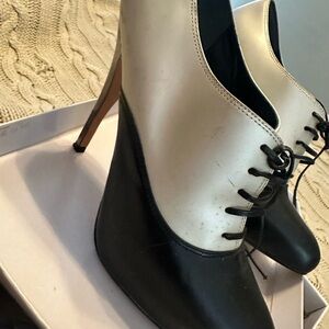 Bebe Black and Cream Lace-Up Heels